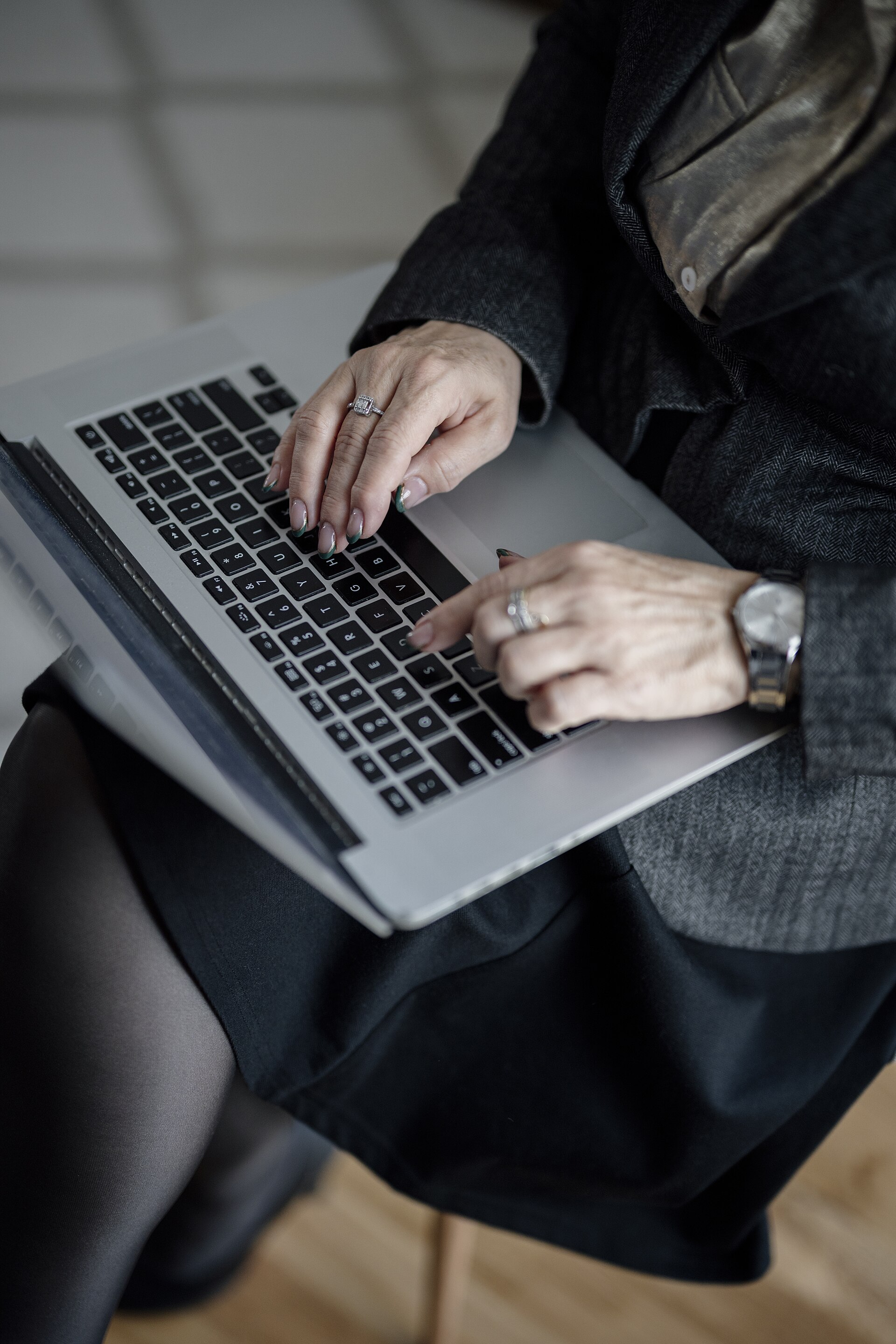 Comparison of AI document tools with laptop and paper files on a modern office desk