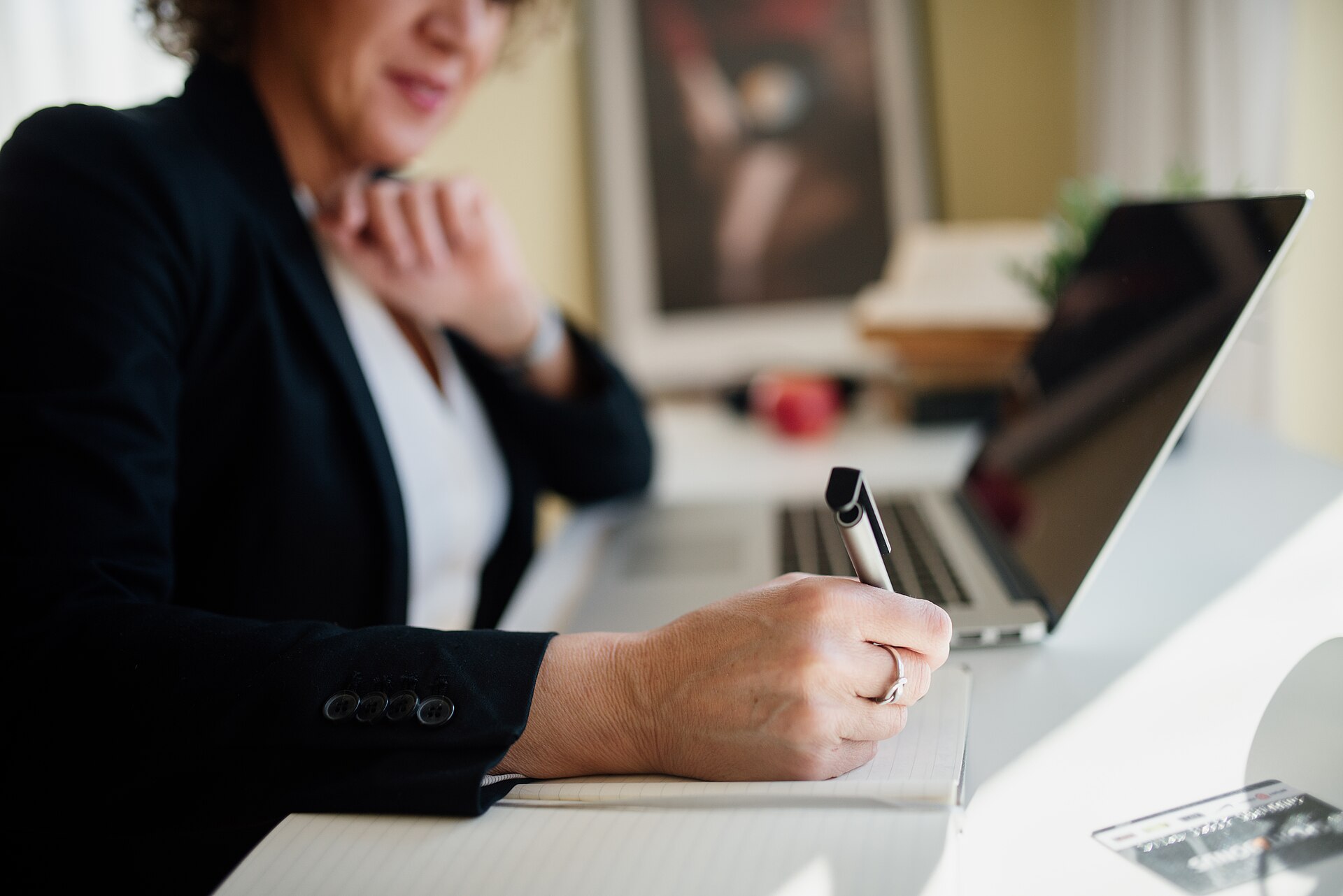 Business professional working with documents on a computer
